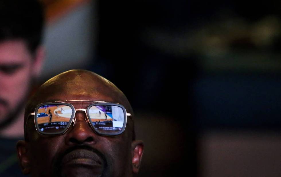 David Davis from California watches the first round of the NCAA men's college basketball tourna ...