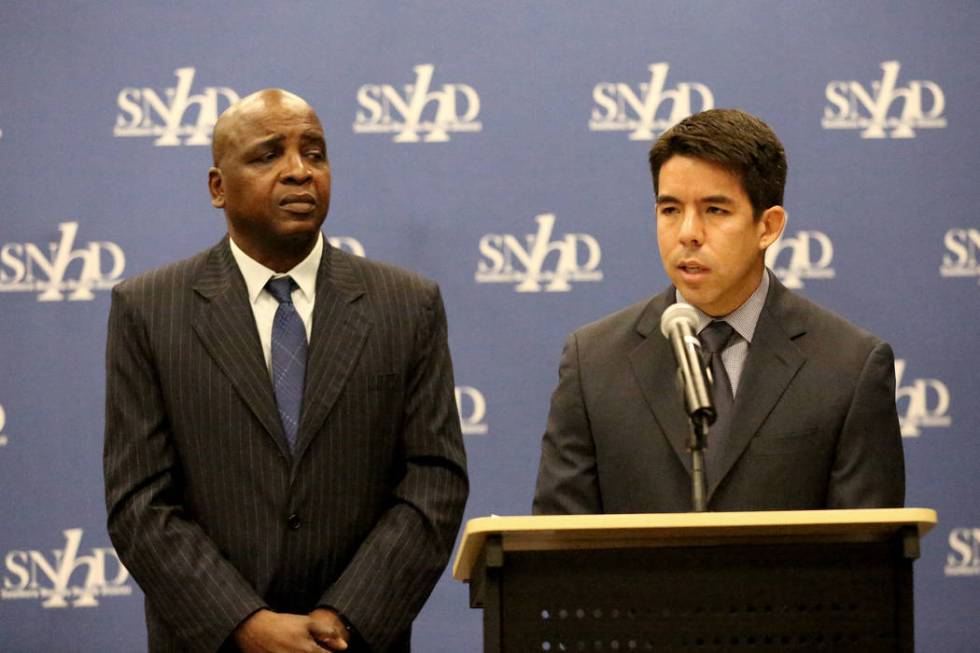 Southern Nevada Health District medical investigator Dr. Vit Kraushaar, right, and acting chief ...