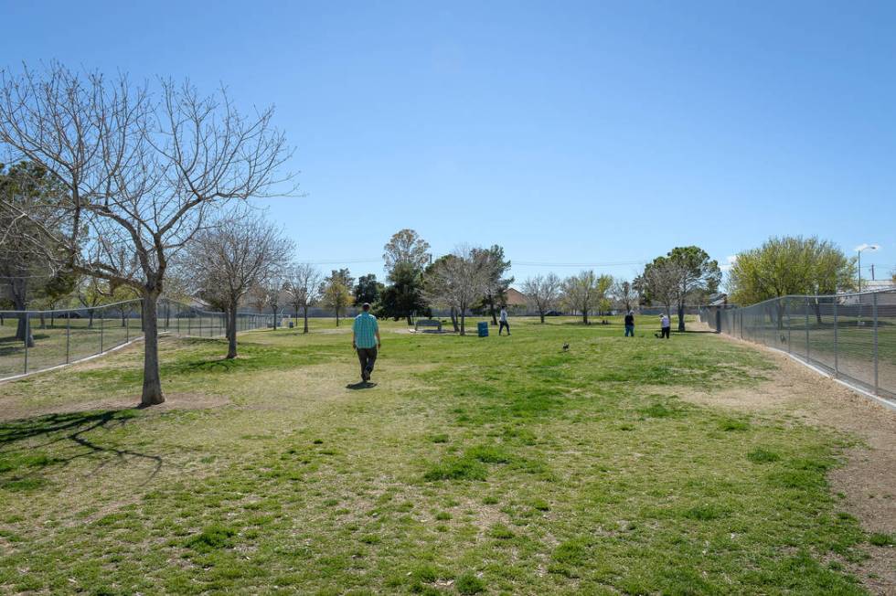 Residents enjoy a sunny afternoon at Woofter Park in Las Vegas, Monday, March 18, 2019. (Caroli ...