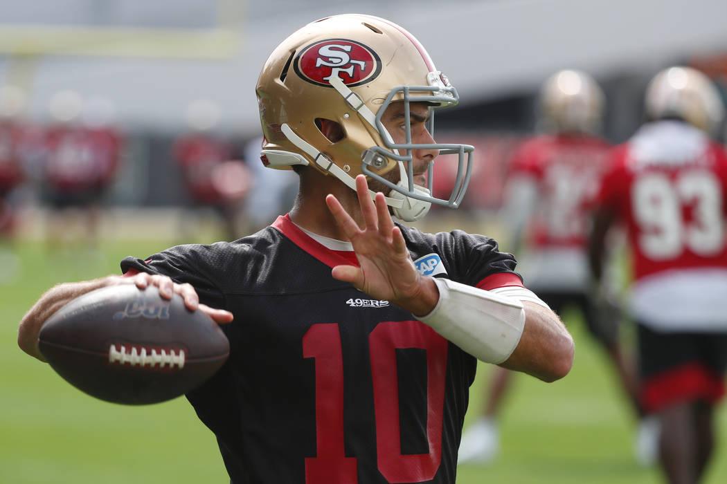 San Francisco 49ers quarterback Jimmy Garoppolo throws during practice for the NFL Super Bowl 5 ...