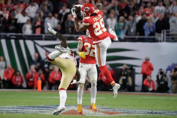 Kansas City Chiefs' Kendall Fuller (29) intercepts the ball against the San Francisco 49ers dur ...