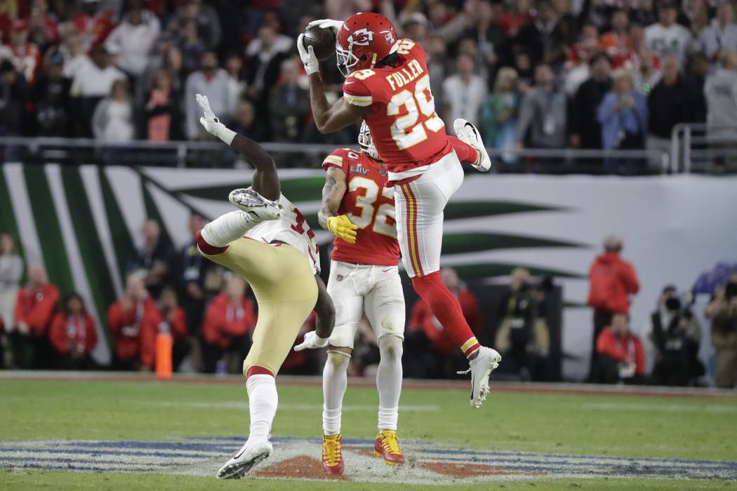 Kansas City Chiefs' Kendall Fuller (29) intercepts the ball against the San Francisco 49ers dur ...