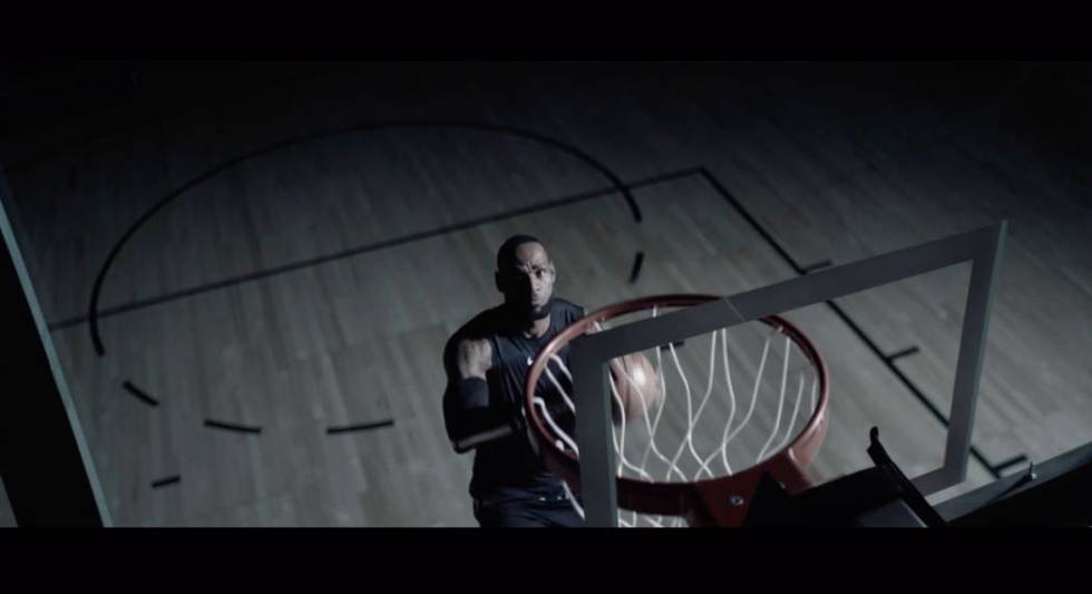 This undated image provided by GMC shows Los Angeles Lakers forward LeBron James in a scene fro ...