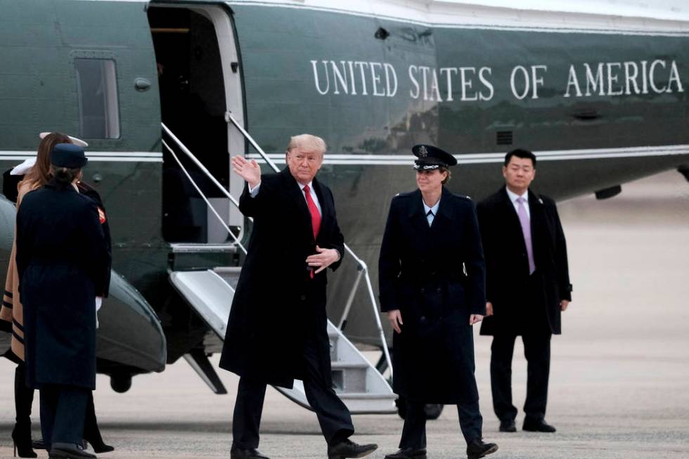 President Donald Trump arrives to board Air Force One at Andrews Air Force Base in Md., Friday, ...