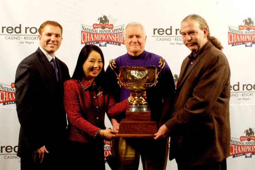 Richard and Sally Goodall pose with the trophy after Richard’s victory in the 2008 Natio ...