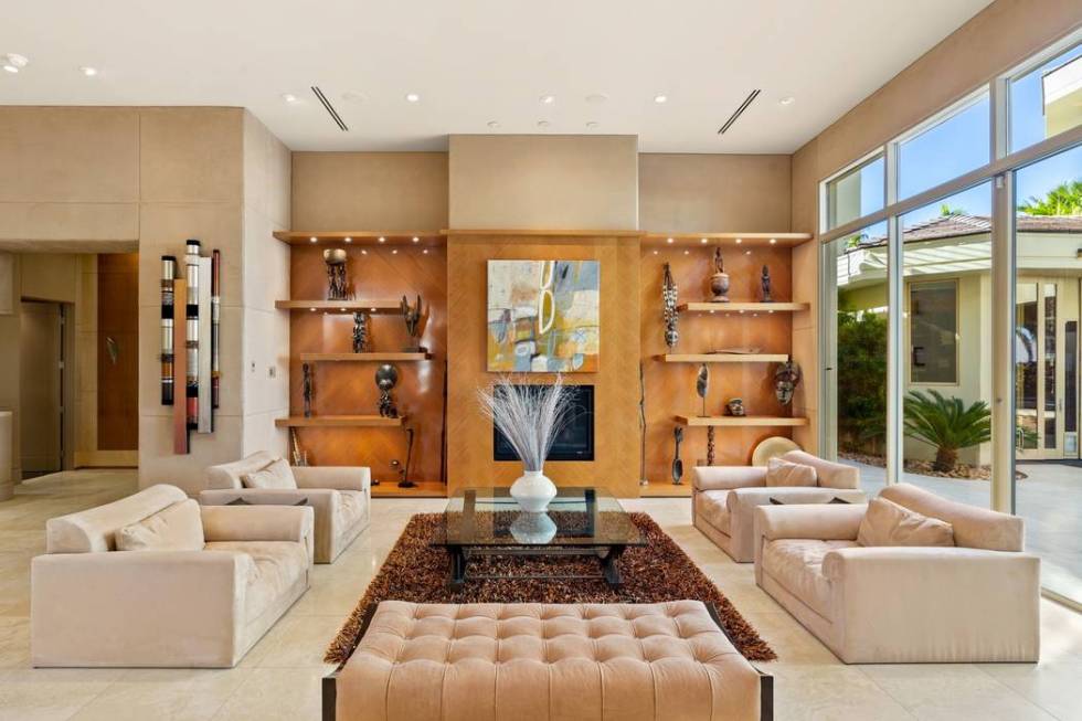 The living room features custom built-in cabinets. (Ivan Sher Group)