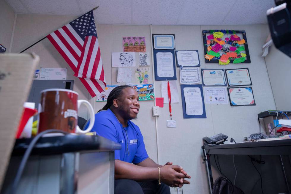 Desert Pines High School's assistant football coach and Life Skills teacher David Hill gives an ...