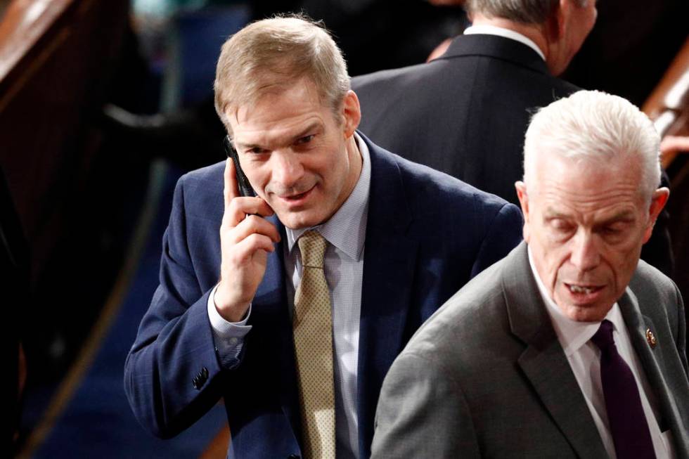 Rep. Jim Jordan, R-Ohio, talks on the phone before President Donald Trump delivers his State of ...