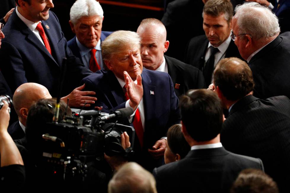 President Donald Trump waves after delivering his State of the Union address to a joint session ...