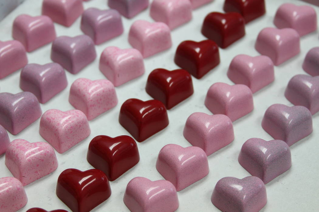 In the box of heart-shaped bonbons at Jean-Marie Auboine, every color is a different flavor. (M ...