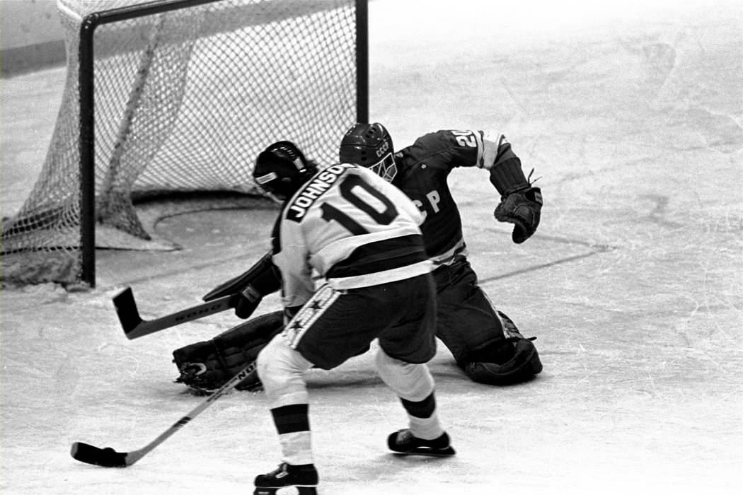 FILE - In this Feb. 22, 1980 file photo, The United States' Mark Johnson (10) prepares to shoot ...