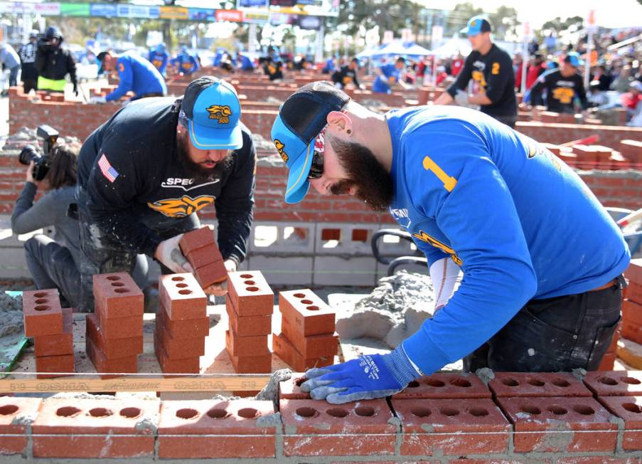 Mario Alves, right, and his tender Michael Alves, both of Ontario, Canada, participates in the ...