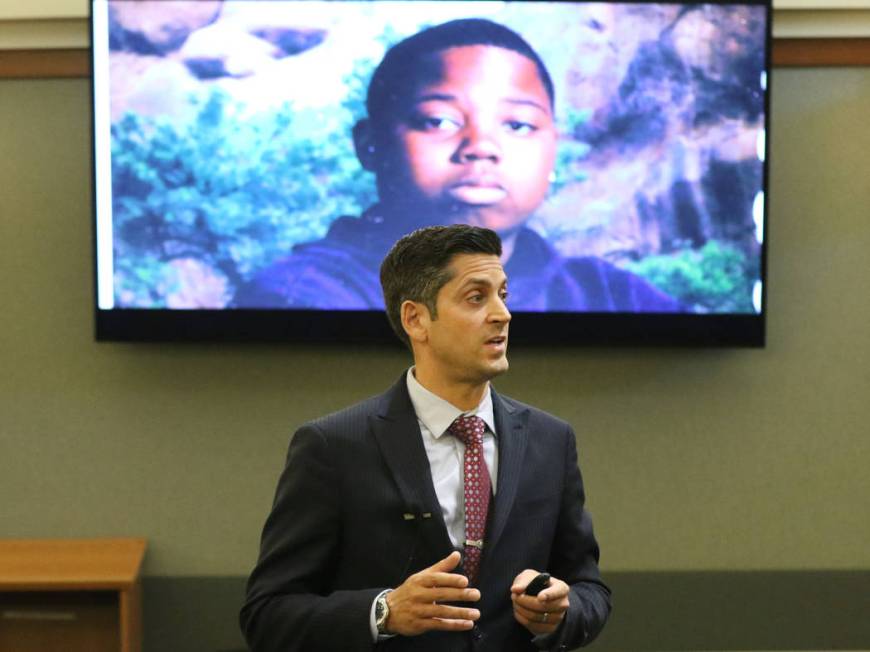 A photograph of Ray Charles Brown is displayed as defense attorney Richard Tanasi addresses the ...