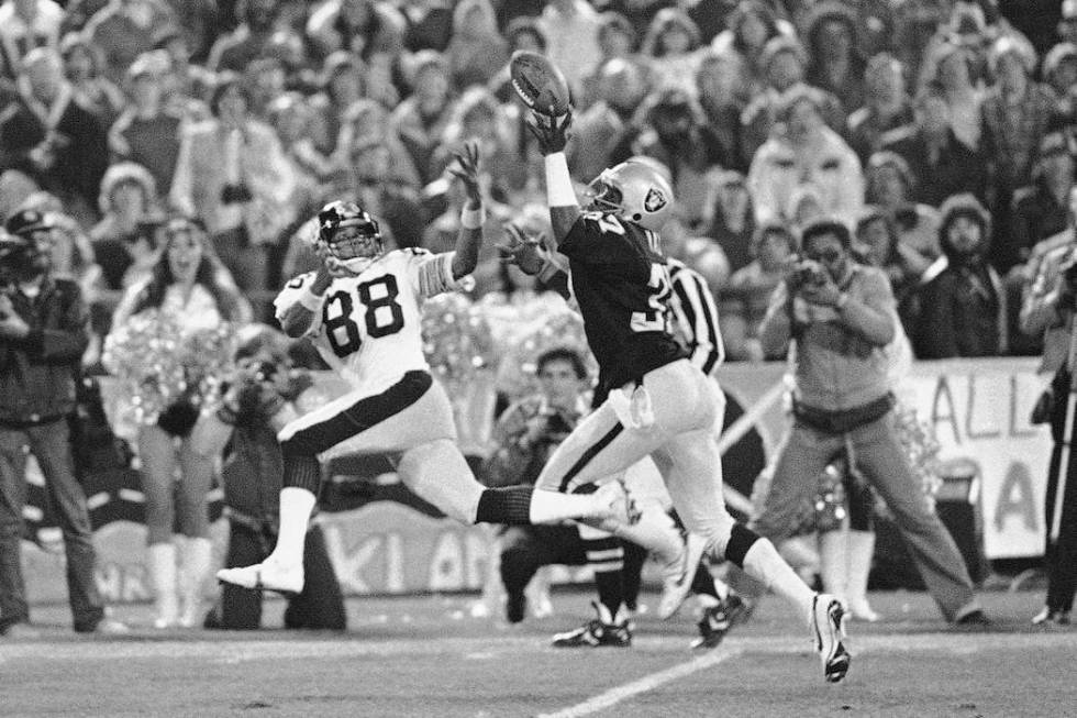 Oakland Raiders back Lester Hayes deflects a pass intended for Pittsburg Steelers wide receiver ...