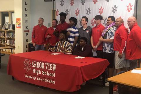 Arbor View football players sign their letter of intent on national signing day on Wednesday, F ...