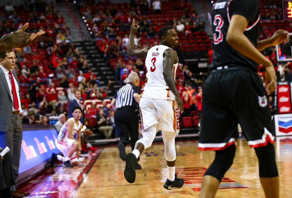 UNLV's guard Amauri Hardy (3) celebrates after scoring a three-pointer against Fresno State dur ...