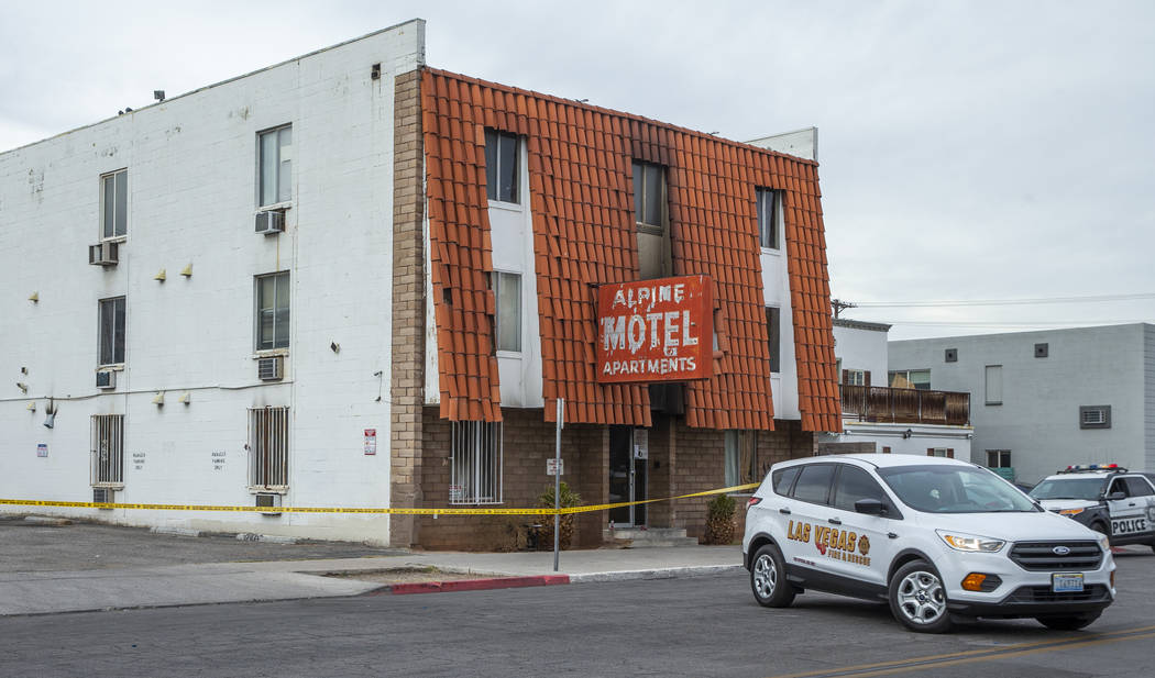 A Las Vegas Fire Department vehicle is parked outside the Alpine Motel Apartments on Dec. 22, 2 ...