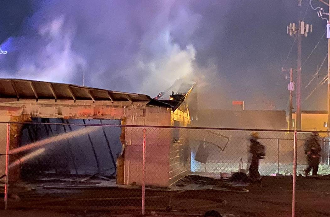 North Las Vegas firefighters battle a blaze at 2511 McCarran St. about 5 a.m. Friday, Feb. 7, 2 ...