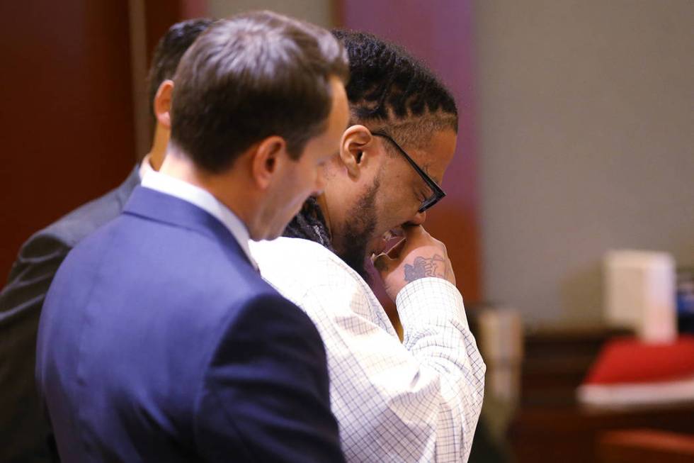 Ray Charles Brown cries as he reads a letter during the penalty phase of his capital murder tri ...