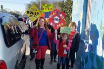 Parent Shuuanndy Alvarez, left, at a rally at Walter Bracken STEAM Academy on Friday, Feb. 7, 2 ...
