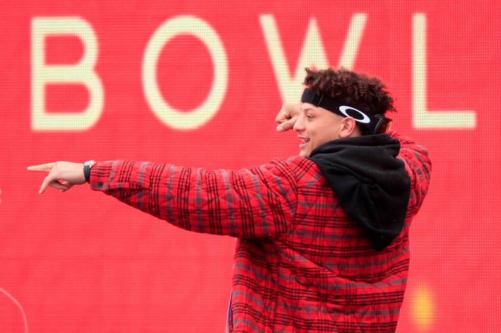 Kansas City Chiefs quarterback Patrick Mahomes celebrates during a Super Bowl parade and rally ...