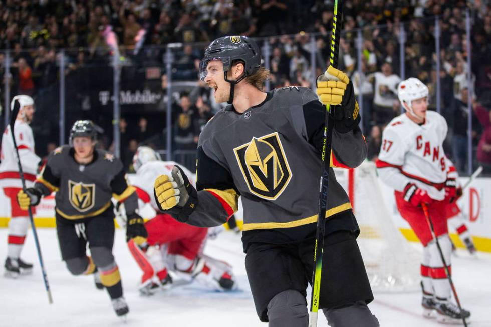 Vegas Golden Knights defenseman Jon Merrill (15) celebrates after scoring a first period goal d ...