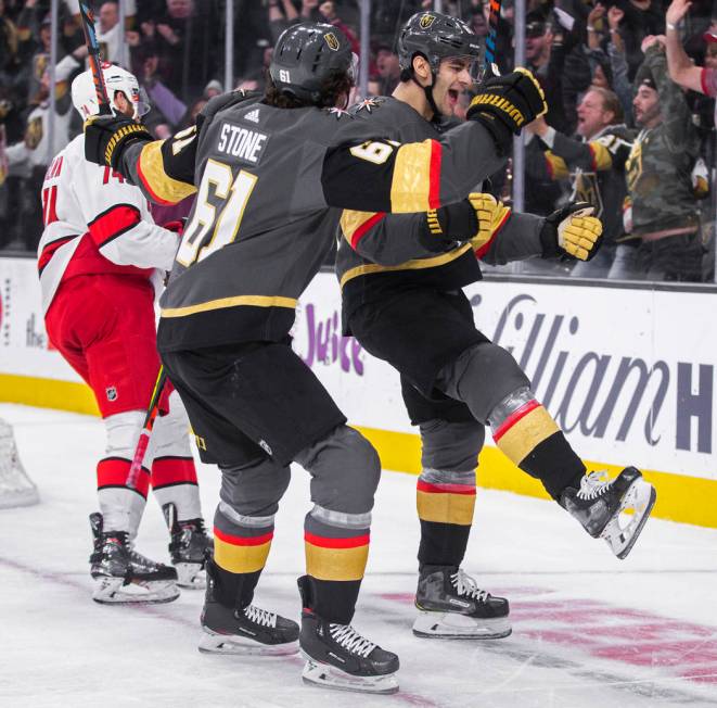 Vegas Golden Knights left wing Max Pacioretty (67) celebrates with Vegas Golden Knights right w ...