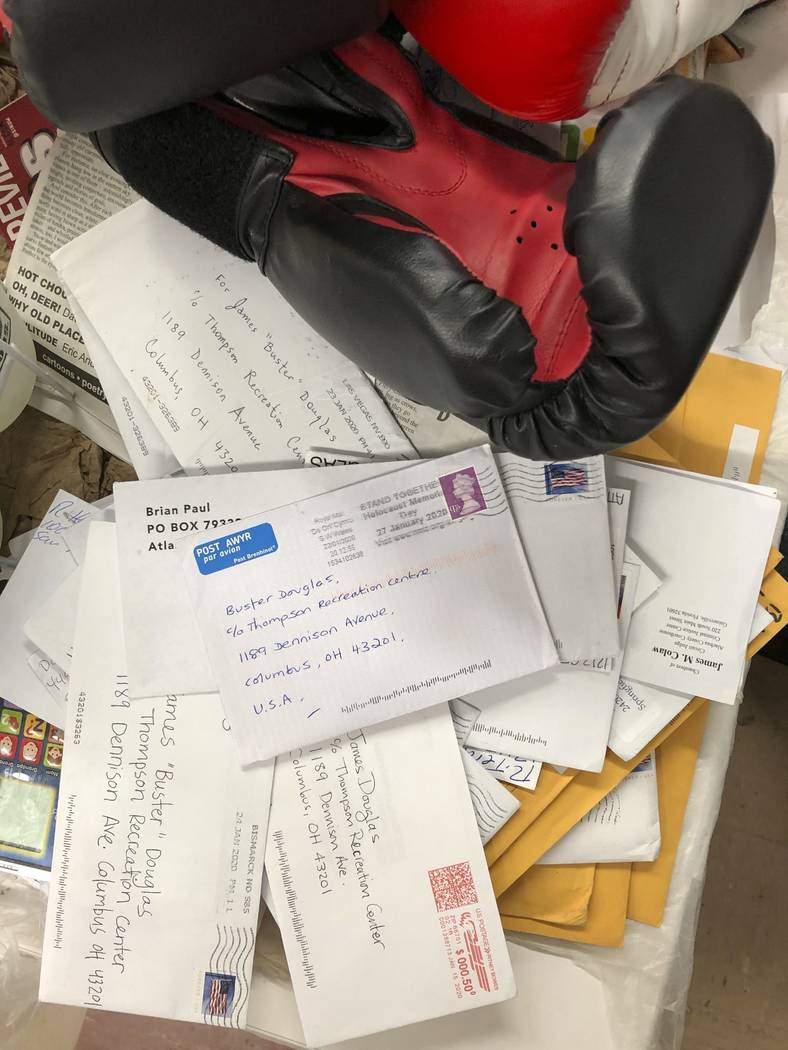 In this Jan. 31, 2020 photo, a stack of fan mail for James "Buster" Douglas, the form ...