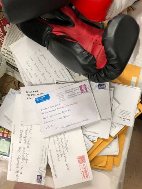In this Jan. 31, 2020 photo, a stack of fan mail for James "Buster" Douglas, the form ...