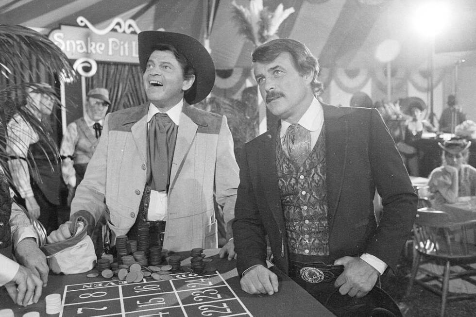 Actors Ross Martin, left, and Robert Conrad, right, are shown while filming a scene of the moti ...