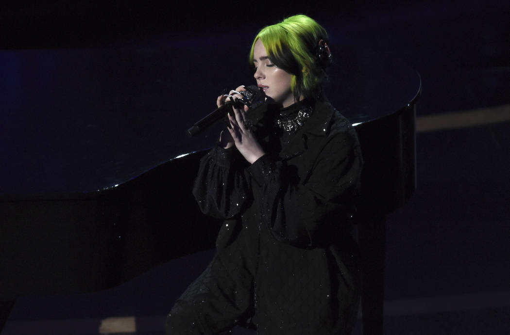 Billie Eilish performs during the in memoriam tribute at the Oscars on Sunday, Feb. 9, 2020, at ...