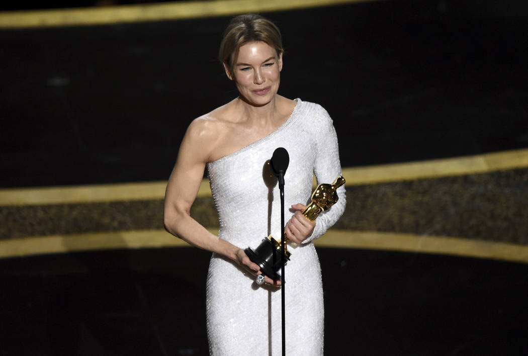 Renee Zellweger accepts the award for best performance by an actress in a leading role for &quo ...