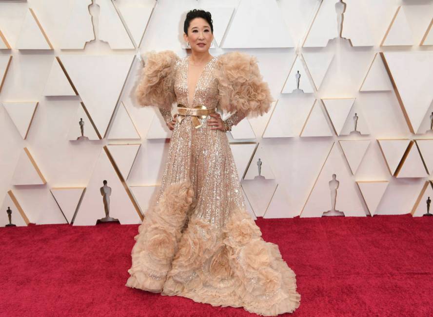 Sandra Oh arrives at the Oscars on Sunday, Feb. 9, 2020, at the Dolby Theatre in Los Angeles. ( ...