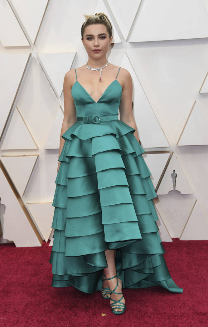 Florence Pugh arrives at the Oscars on Sunday, Feb. 9, 2020, at the Dolby Theatre in Los Angele ...