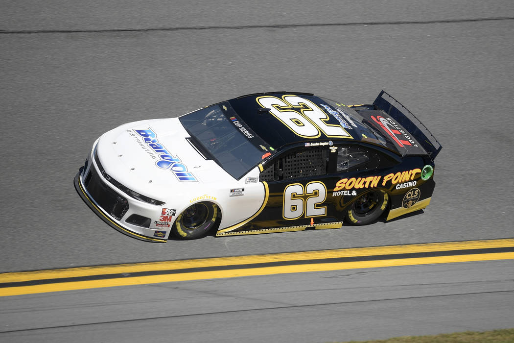 Brendan Gaughan (62) makes his way through Turn 4 during NASCAR Daytona 500 auto race qualifyin ...