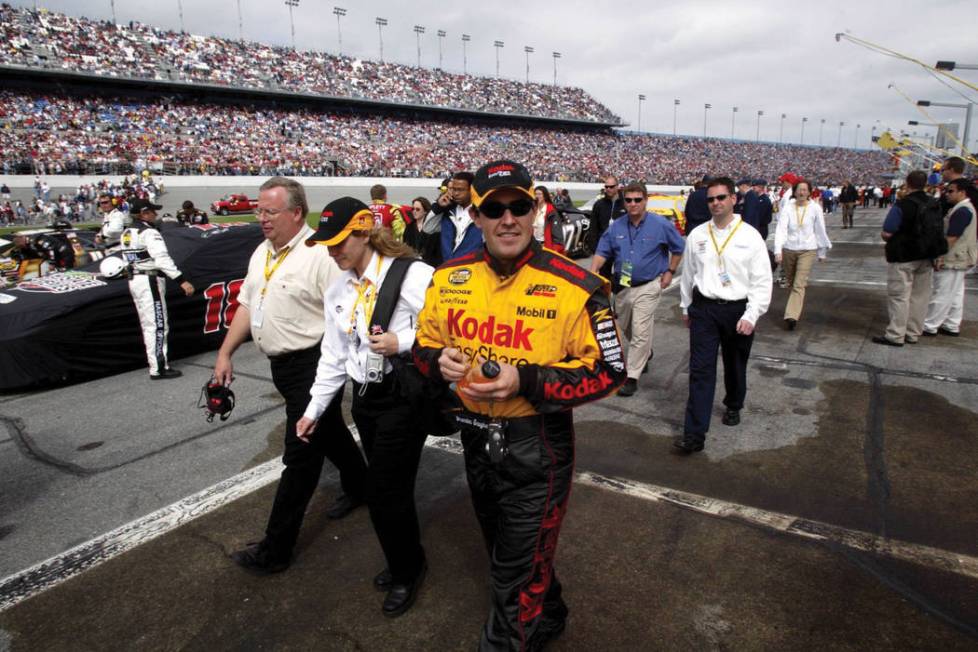 NASCAR Nextel Series Cup driver Brendan Gaughan, from Las Vegas, walks on pit road before compe ...