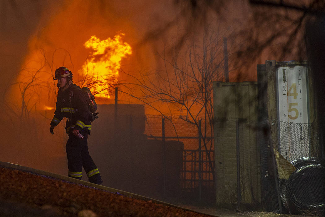 North Las Vegas Fire and Las Vegas Fire departments knock down a fire about the Purcell Tire an ...