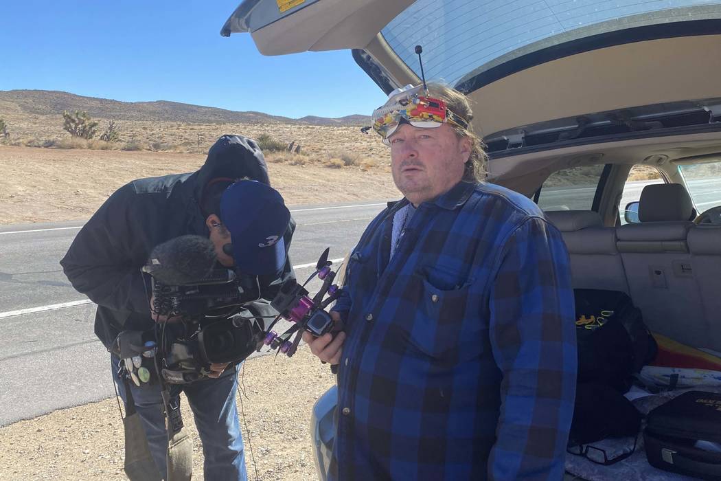 Todd Tatum holds a drone he hoped to use to try and help find missing hiker Ronnie Lucas. (Glen ...