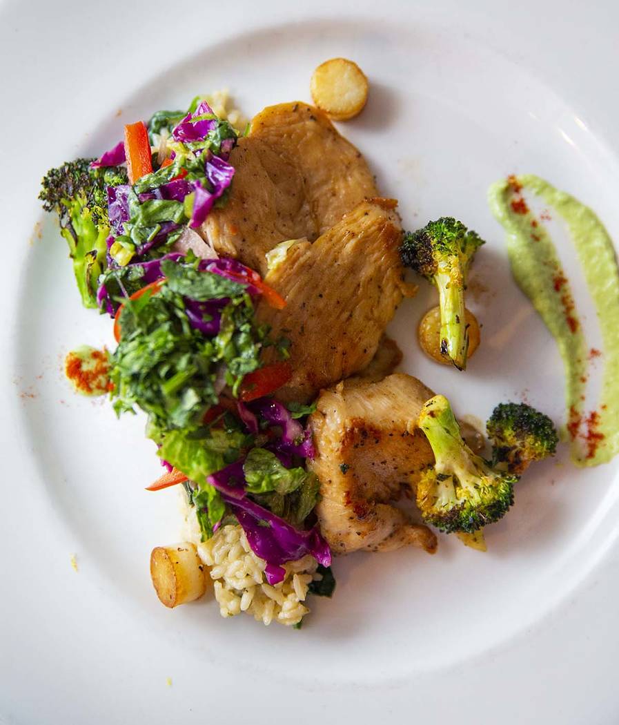 A seared chicken scallop and creamy spinach rice dish by Chef Oscar Sanchez, Chef Battle Las Ve ...