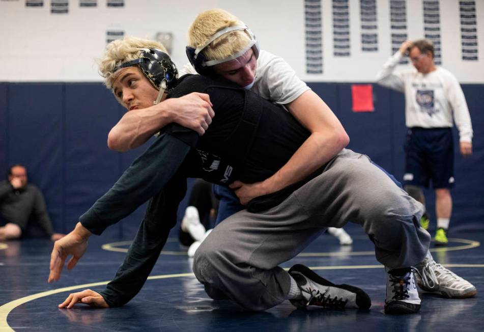 Senior Weston Presser, top, wrestles against senior Matt Van Riel, bottom, during the last prac ...