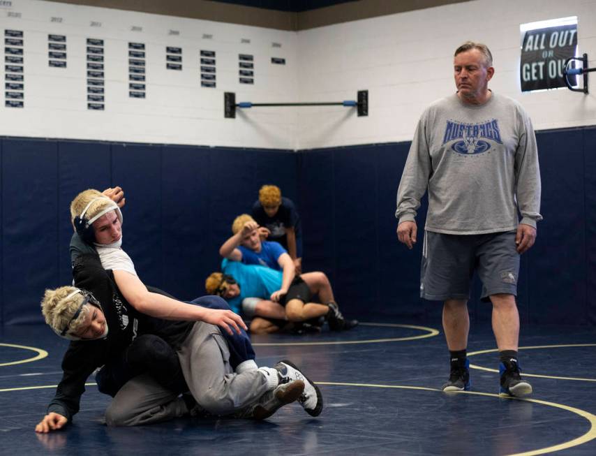 Senior Weston Presser, top, wrestles against senior Matt Van Riel, bottom, during the last prac ...