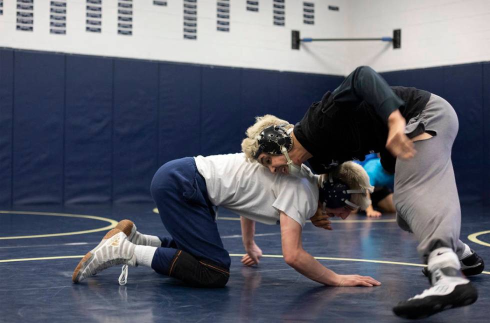 Senior Matt Van Riel, right, wrestles against senior Weston Presser, left, during the last prac ...