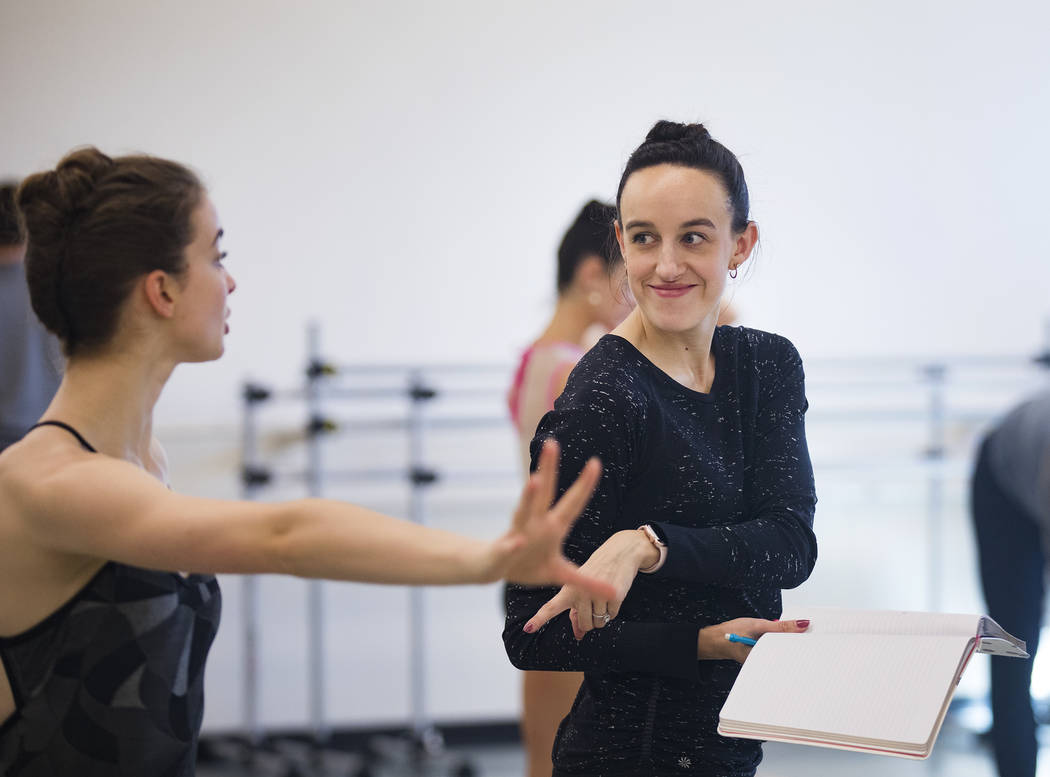 Krista Baker, director and choreographer, right, speaks with dancer Ana Peabody during rehearsa ...