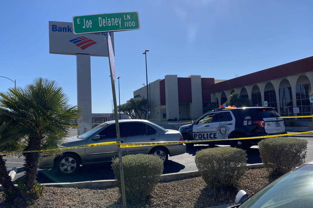 Las Vegas police investigate a shooting Thursday afternoon in southeast Las Vegas near the UNLV ...