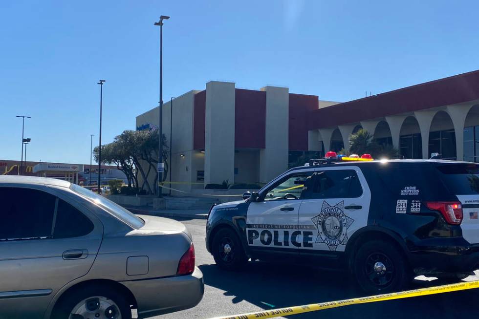 Las Vegas police investigate a shooting Thursday afternoon in southeast Las Vegas near the UNLV ...