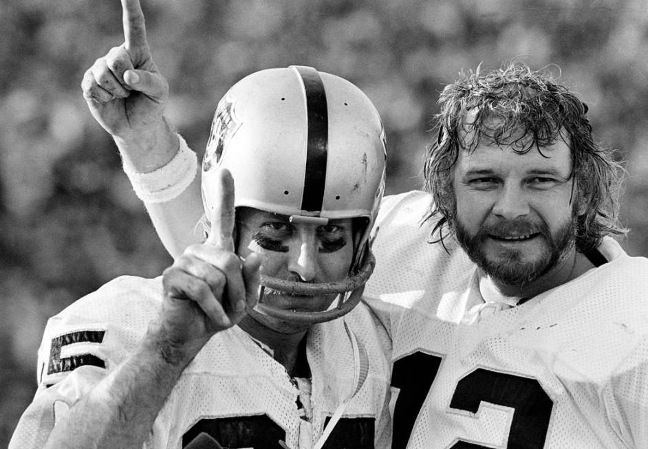 In this Jan. 9, 1977, file photo, receiver Fred Biletnikoff, left, and quarterback Ken Stabler ...