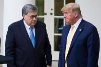 In a July 11, 2019, file photo, Attorney General William Barr, left, and President Donald Trump ...