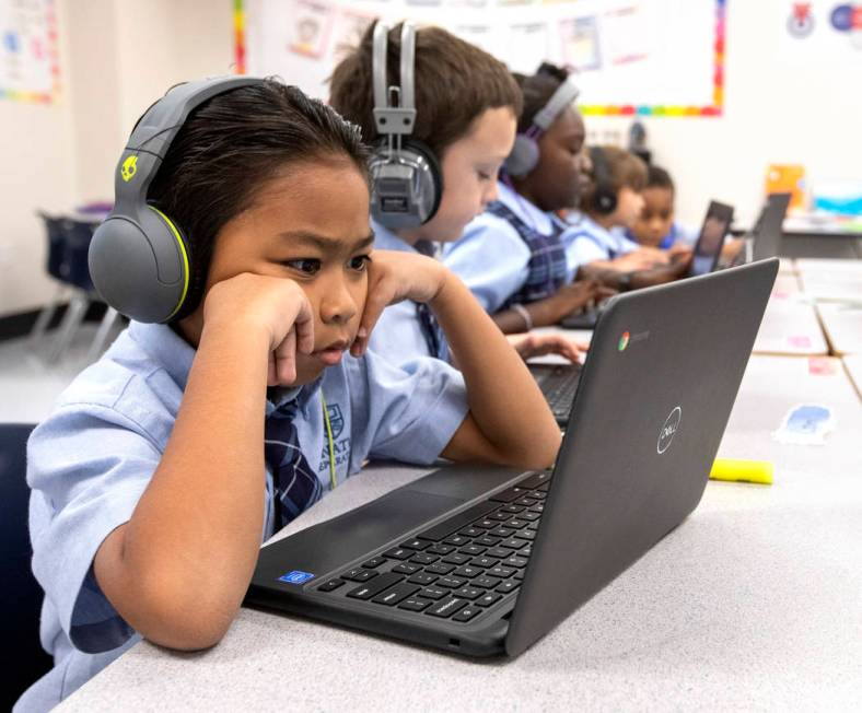 Second grader Anton Casis concentrates on his computer on Wednesday, Oct. 23, 2019, at Signatur ...