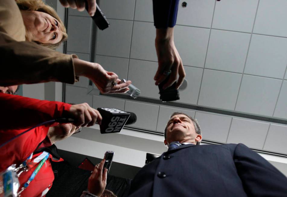 USA women's ice hockey coach Mark Johnson is interviewed during a press conference in Vancouver ...