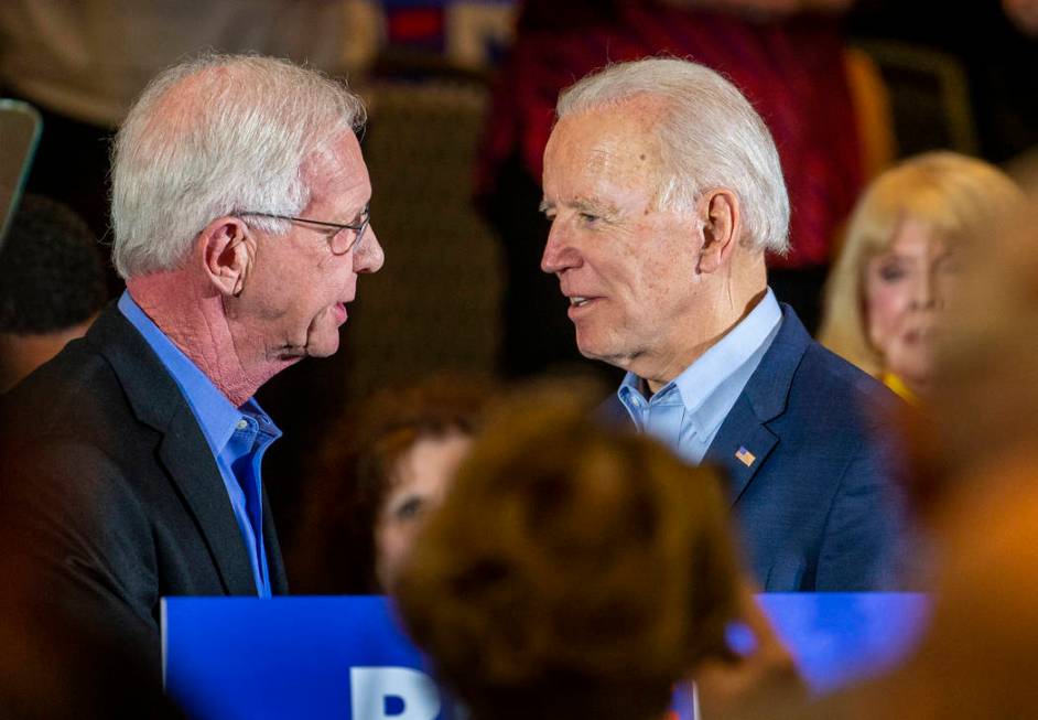 Capt. Chesley "Sully" Sullenberger, left, introduces former Vice President Joe Biden ...